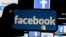 logo de Facebook desplegado en celular